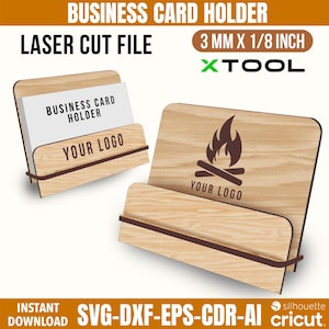Może przedstawiać: Drewniany wizytownik z wycinanym laserowo wzorem. Uchwyt zawiera tekst "BUSINESS CARD HOLDER" i "YOUR LOGO". Projekt zawiera grafikę ogniska. Wymiary to 3 mm x 3,2 mm.
