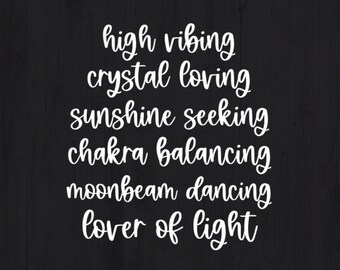 May include: White script text on a black background. The text includes phrases like "high vibing," "crystal loving," and "lover of light." The design has a spiritual or inspirational theme.