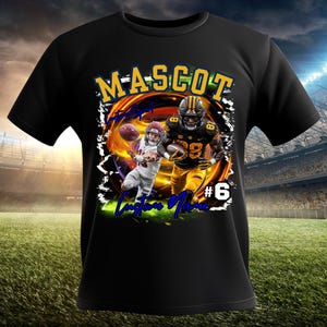 May include: Black t-shirt with a graphic of two football players in a stadium setting. The text "MASCOT" is in large letters above the players. The text "Custom Name" and "#6" are below the players.