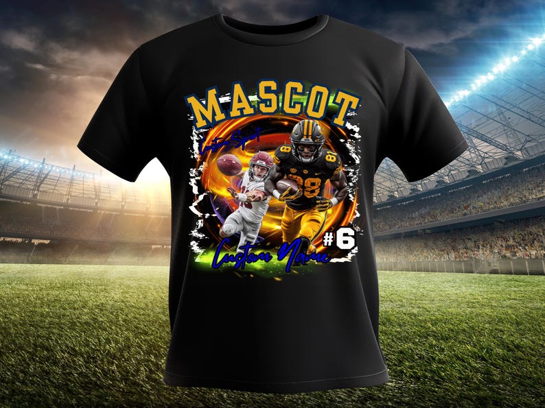 May include: Black t-shirt with a graphic of two football players in a stadium setting. The text "MASCOT" is in large letters above the players. The text "Custom Name" and "#6" are below the players.
