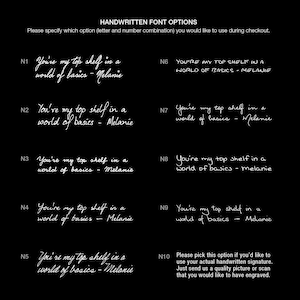 May include: A black and white image showing 10 different handwritten font options for the phrase "You're my top shelf in a world of basics - Melanie".  The font options are labeled N1 through N10. Option N10 is a placeholder for a custom handwritten signature.
