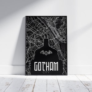 May include: Black and white print of a city map with a Batman silhouette in the center. The text "Gotham City" is printed below the silhouette.