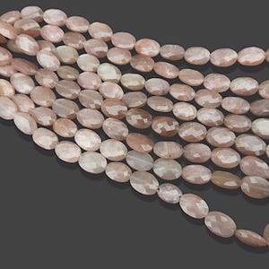 Contas ovais facetadas de pedra da lua pêssego: joias com pedras preciosas naturais (9 x 7 mm)