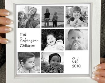 May include: A white framed photo collage featuring nine black and white images of children. The text "The Robinson Children" is displayed, along with "Est. 2010". The frame is held by a person.