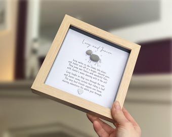 May include: A square light wood frame containing a white background with the text Lucy and Junior, a pebble art horse figure, and a poem about friendship. A small silver heart is positioned at the bottom center of the white display area.