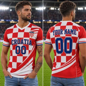A man wearing a red and white Croatia soccer jersey with the number 00, standing on a soccer field.