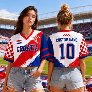 A woman wearing a red, white, and blue Croatia soccer jersey with the custom name "10" and the number "10" on the back, standing in front of a stadium.