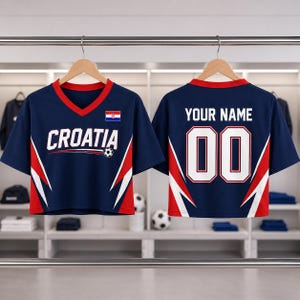 A pair of navy blue soccer jerseys with red and white accents, featuring the word "Cratia" and the number "00" on the back.