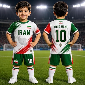 May include: A soccer uniform set featuring a white jersey with green and red brushstroke accents, the text IRAN, a map graphic, and the Iranian flag. The back displays the text YOUR NAME and the number 10. Green shorts with the number 10 and white socks.