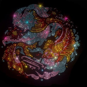May include: A circular design featuring a pair of fish swimming in a swirling pattern. The design is made of colorful rhinestones, including pink, blue, gold, and red.