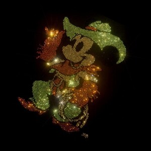 May include: A sparkling rhinestone cowboy Mickey Mouse design. The design is made of gold, green, and orange rhinestones.