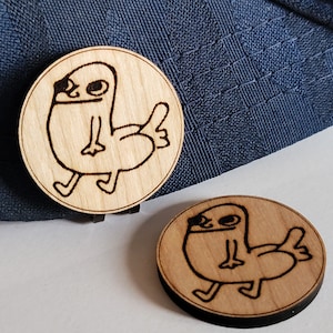 Dickbutt golf ball marker, Laser engraved into Cherry wood or Red Cedar wood.  Includes magnetic backer.   High quality
