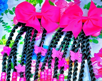 Kids braided ponytail extensions with beads, clip bows, and adjustable bands. Twists and braids ponytails clip and go