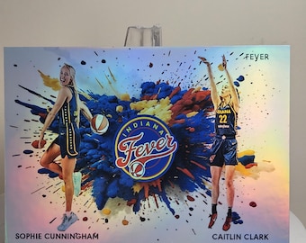 May include: A basketball trading card featuring two players in Indiana Fever uniforms. The card has a holographic background with colorful paint splashes. The Indiana Fever logo is in the center. The players are Sophie Cunningham and Caitlin Clark.