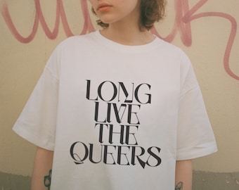 May include: White t-shirt with black text that reads "LONG LIVE THE QUEERS".