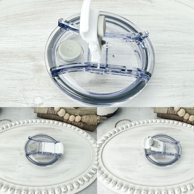 May include: Clear plastic tumbler lid with a white flip-top closure and a small, gray silicone plug. The lid has a dark gray rim and is designed to fit a tumbler. The image shows the lid from multiple angles.