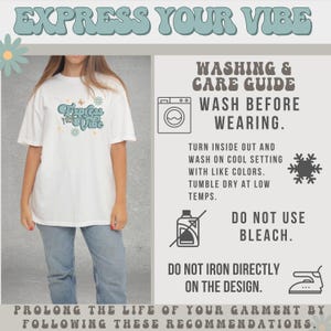 May include: White t-shirt with the text "Express Your Vibe" in a retro font, worn with blue jeans. The image includes washing instructions: wash before wearing, wash with like colors, do not bleach, and do not iron directly on the design.