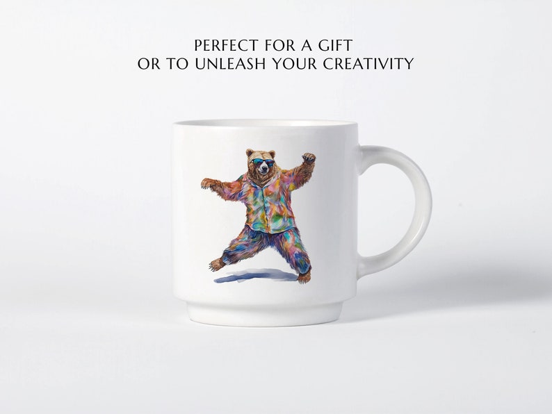 May include: White ceramic mug featuring a colourful illustration of a bear wearing sunglasses and a patterned shirt. The bear is dancing with its arms outstretched. The mug has a handle on the right side.