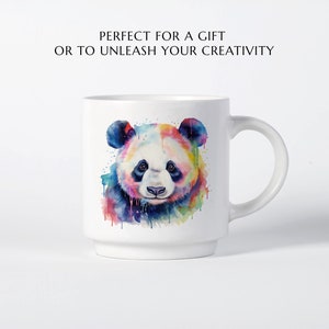 May include: White ceramic mug with a colorful watercolor illustration of a panda bear. The panda has black eyes and a black nose. The background is a light blue with splashes of pink, yellow, green, and purple.
