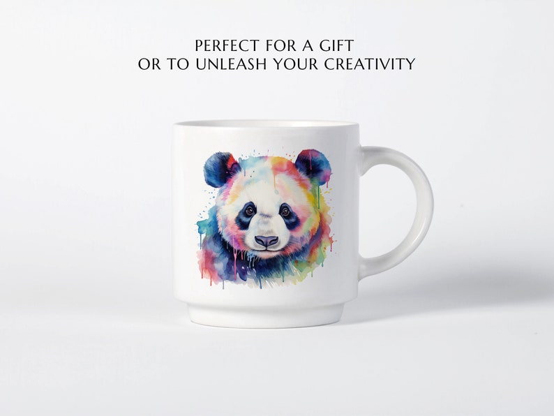 May include: White ceramic mug with a colorful watercolor illustration of a panda bear. The panda has black eyes and a black nose. The background is a light blue with splashes of pink, yellow, green, and purple.