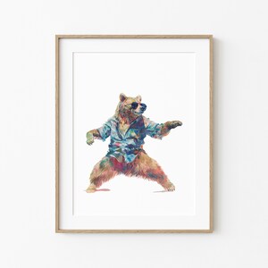 May include: A watercolour painting of a brown bear wearing sunglasses and a blue and white patterned shirt. The bear is standing in a fighting stance with its arms outstretched.