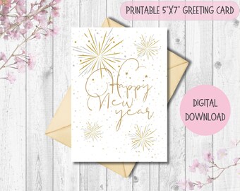 Peut inclure: Carte de vœux imprimable de 12,7 cm x 17,8 cm avec un fond blanc et des feux d'artifice dorés et argentés. Le texte "Happy New Year" est écrit en cursive.