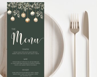 May include: A dark green menu card with the word "The Menu" in elegant white script. The menu features a floral and ornament design at the top. A plate, fork, and knife are in the background.