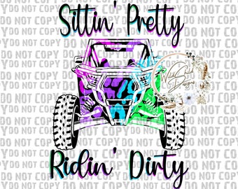 May include: A black and white illustration of a side-by-side off-road vehicle with a pink, purple, and green camouflage pattern. The text "Sittin' Pretty Ridin' Dirty" is written in black with a pink, purple, and green outline.