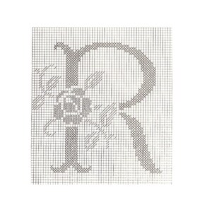 May include: Black and white cross-stitch pattern of the letter R with a small flower design in the center.