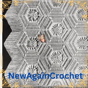 May include: A close-up of a white crocheted blanket with a repeating pattern of hexagonal flowers. A small butterfly is resting on the blanket.