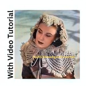 May include: A close-up of a woman wearing a white crocheted hooded shawl. The shawl has a delicate lace pattern and a scalloped edge. The woman is wearing a dark jacket and has dark hair. The image is in color and has a vintage feel.
