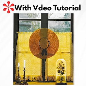 May include: A straw hat with a black ribbon hangs in front of a window with yellow curtains. The image includes a glass cloche with dried flowers and two ornate candle holders. The text "With Vdeo Tutorial" is at the top.