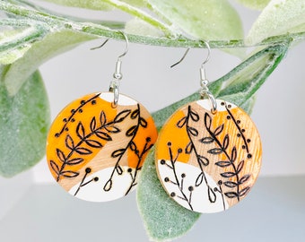 Wood-burned Circular Painted Plant Earrings, Orange and White