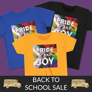 May include: Three t-shirts in blue, yellow, and black, each featuring a floral design with the words "PRIDE AND JOY." The shirts are part of a "BACK TO SCHOOL SALE" promotion, with school bus graphics at the bottom.