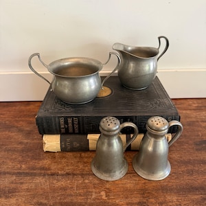 Set of 4 Vintage Solid Pewter service pieces, creamed, sugar dish and salt and pepper shakers