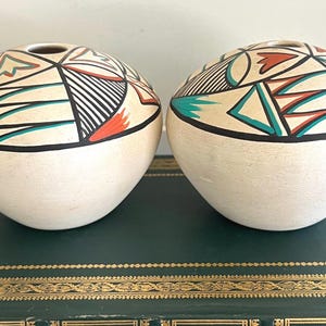 Two Vintage Navajo Polychrome Seed pots signed by artist H. Yellowhorse 1993