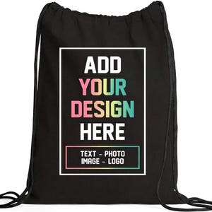 May include: A black drawstring backpack featuring a white rectangular frame containing the text ADD YOUR DESIGN HERE in a pastel gradient font, with a smaller box below displaying the text TEXT - PHOTO IMAGE - LOGO in white and gradient.