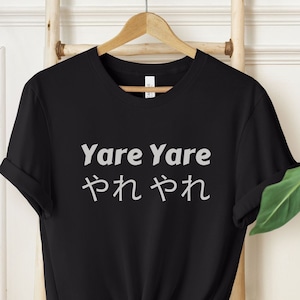May include: Black t-shirt with the text "Yare Yare" and the Japanese characters for "Yare Yare" in white.