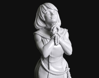 Devotion Series 04a - Sisters of Battle Nun Praying and Kneeling by Manufaktura Miniatures