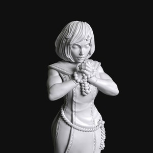 Devotion Series 03a - Sisters of Battle Nun Praying and Walking by Manufaktura Miniatures
