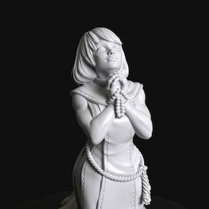 Devotion Series 04a - Sisters of Battle Nun Praying and Kneeling by Manufaktura Miniatures