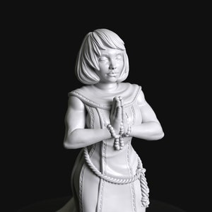 Devotion Series 05a - Sisters of Battle Nun Praying and Kneeling by Manufaktura Miniatures