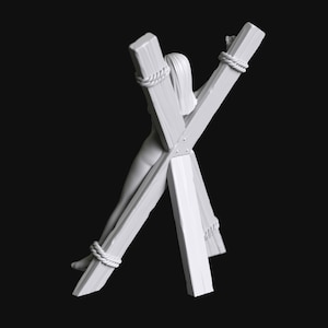 May include: White painted wooden figure of a person tied to a wooden cross. The figure is tied at the wrists and ankles with rope. The cross is made of four pieces of wood, with the two longer pieces forming the cross shape and the two shorter pieces forming the base.