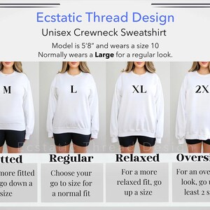 Op de afbeelding: Maattabel voor een unisex crewneck sweatshirt. De tabel toont de verschillende beschikbare maten, van M tot 2XL, en hoe ze passen. Het model is 1,73 m lang en draagt maat 10, normaal gesproken draagt ze maat L voor een normale look.