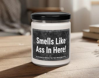 Qui dentro puzza di culo – Divertente candela profumata da regalare