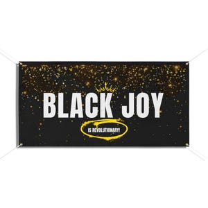 May include: Black banner with gold glitter and the words "BLACK JOY" in large white letters. A gold crown sits above the words, and below is the phrase "IS REVOLUTIONARY!" in a yellow oval.