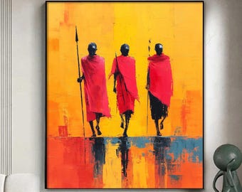 Quadro su tela con raffigurazione di guerrieri africani, dai colori vivaci rosso e arancione.