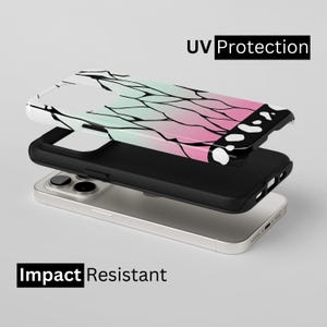 May include: A phone case with a black frame and a white, pink, and green butterfly wing design. The case is layered over a black phone case and a silver phone. Text on the image reads "UV Protection" and "Impact Resistant."