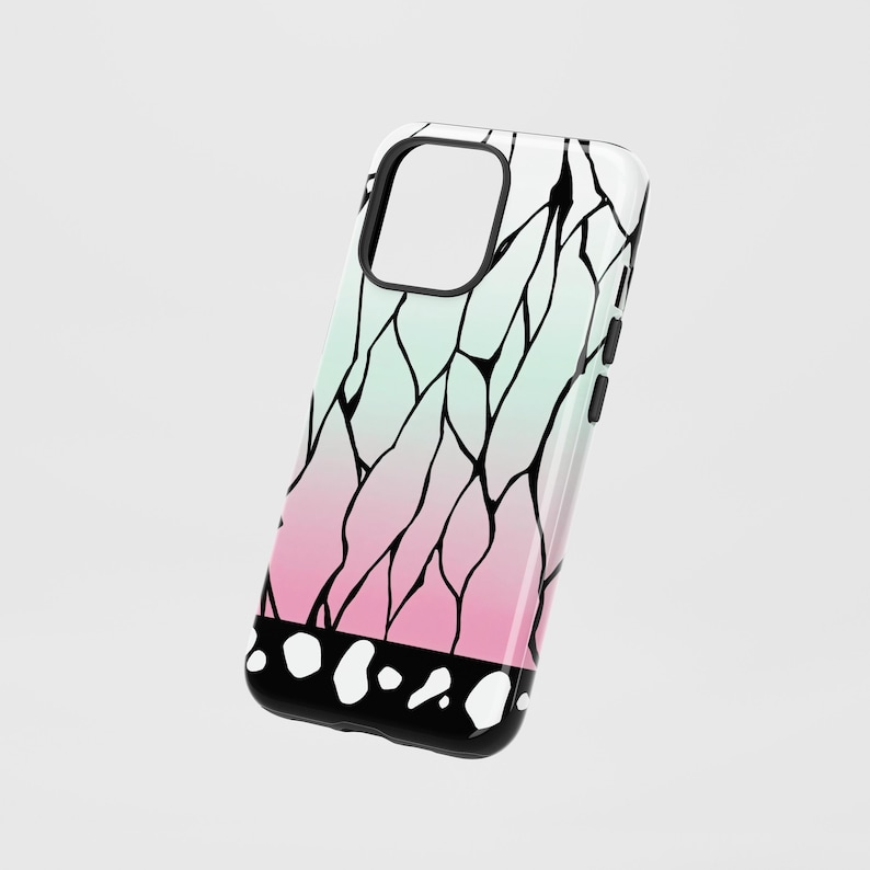 May include: A phone case with a gradient design of pink and mint green, with black vein-like lines. The bottom edge is black with white circular accents. The case has a black border around the camera cutout and buttons.