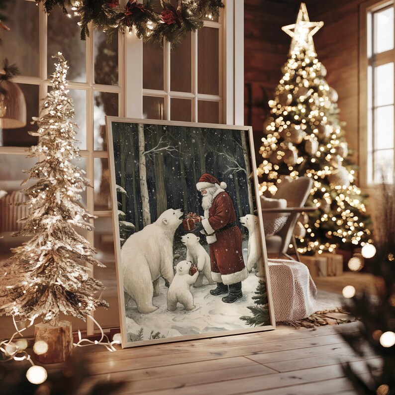 May include: A painting of Santa Claus giving gifts to a family of polar bears in a snowy forest. The bears are white and the forest is dark green. Santa is wearing a red suit with white trim and a white beard. The painting is framed in a light wood frame.